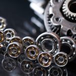 Machinery,Concept.,Set,Of,Various,Gears,And,Ball,Bearings,On